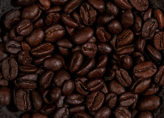 coffee beans on brown wooden table