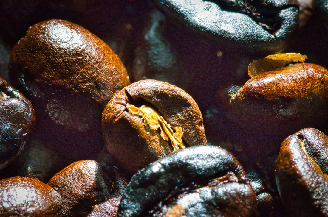 A pile of coffee beans sitting on top of each other