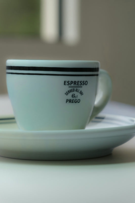 Espresso cup and saucer with black stripes